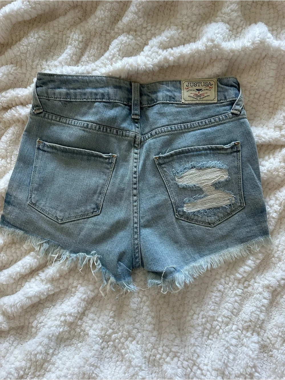 Light Blue Distressed Denim Cutoff Shorts